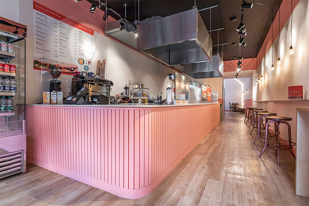 Commercial track lighting in a contemporary retail space