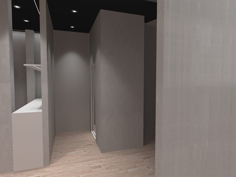 Salon circulation area lit by recessed downlights