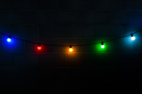 Multi-colour festoon lights at night