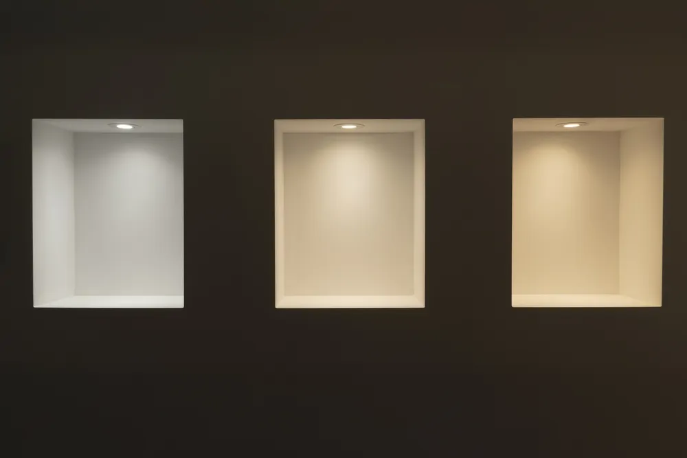 Three wall niches lit by Super Focus LED lamps in cool, neutral and warm white
