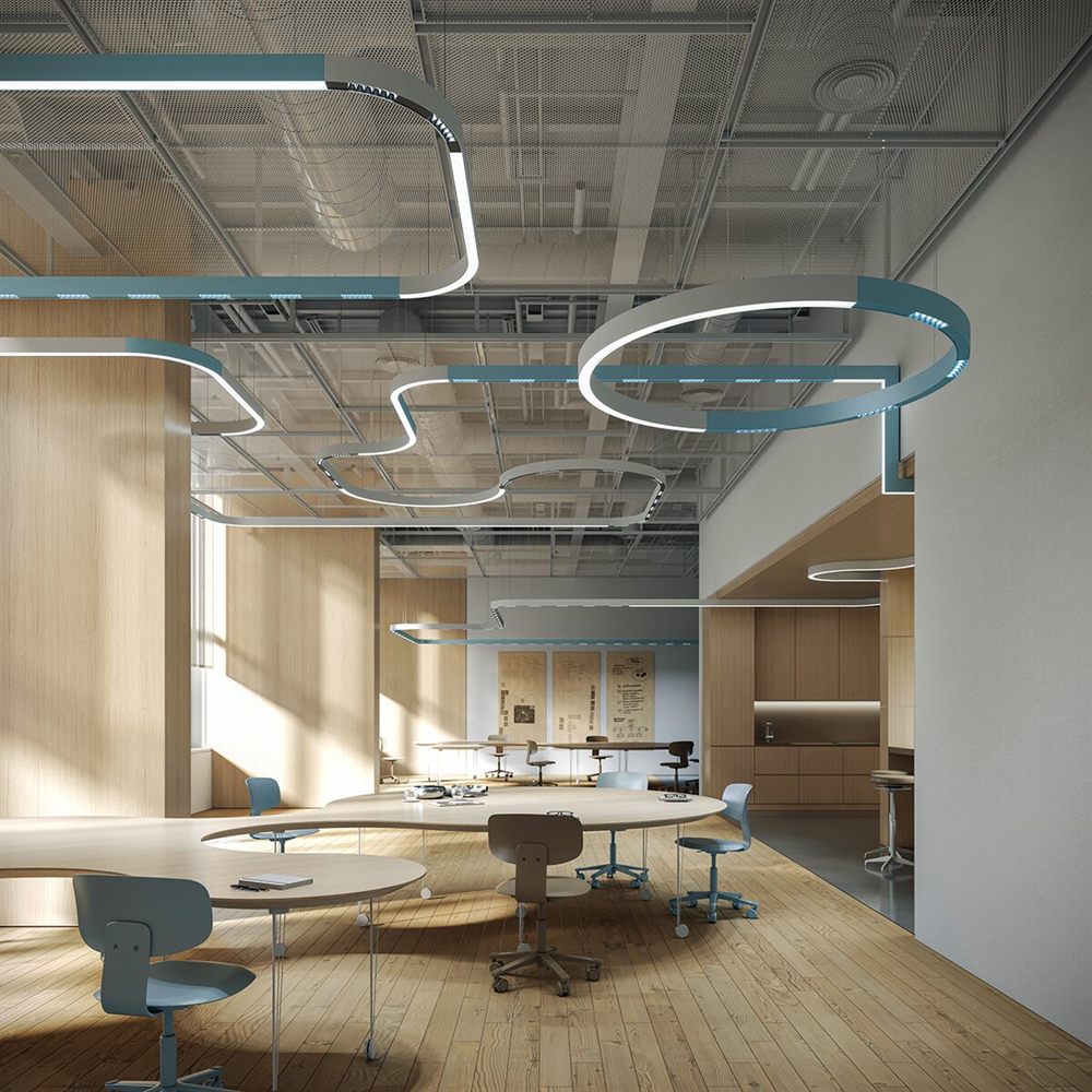 Serpent Plus rings and rounded rectangles over an open-plan office