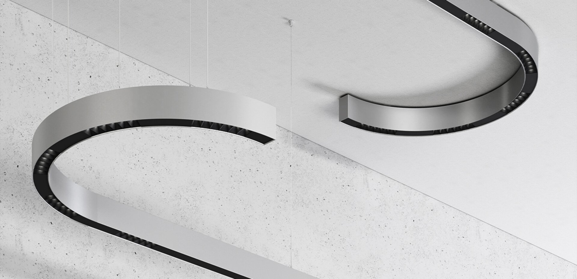 Serpent Plus with DOT optics curving through a semicircle, shown suspended and surface mounted